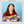 Load image into Gallery viewer, woman unboxing a gift from a Prank-o joke gift box
